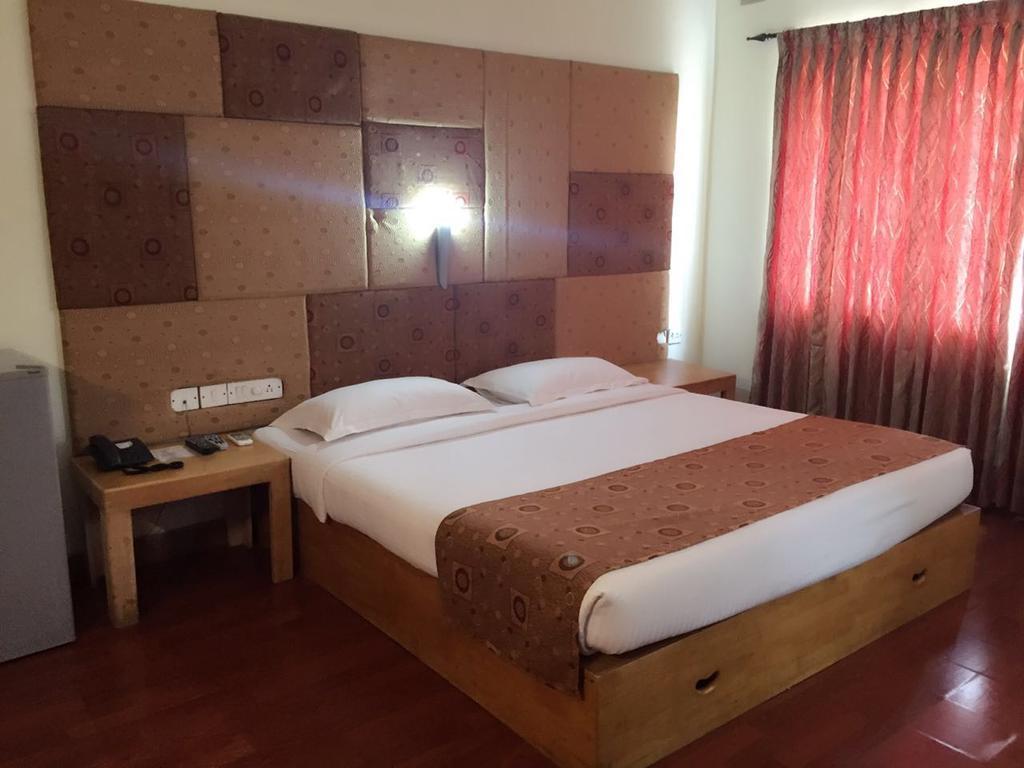 Dejavu Hotel Kojambuttúr Kültér fotó